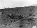 two tanks form a v where they have both slipped off road. tole area  italy.